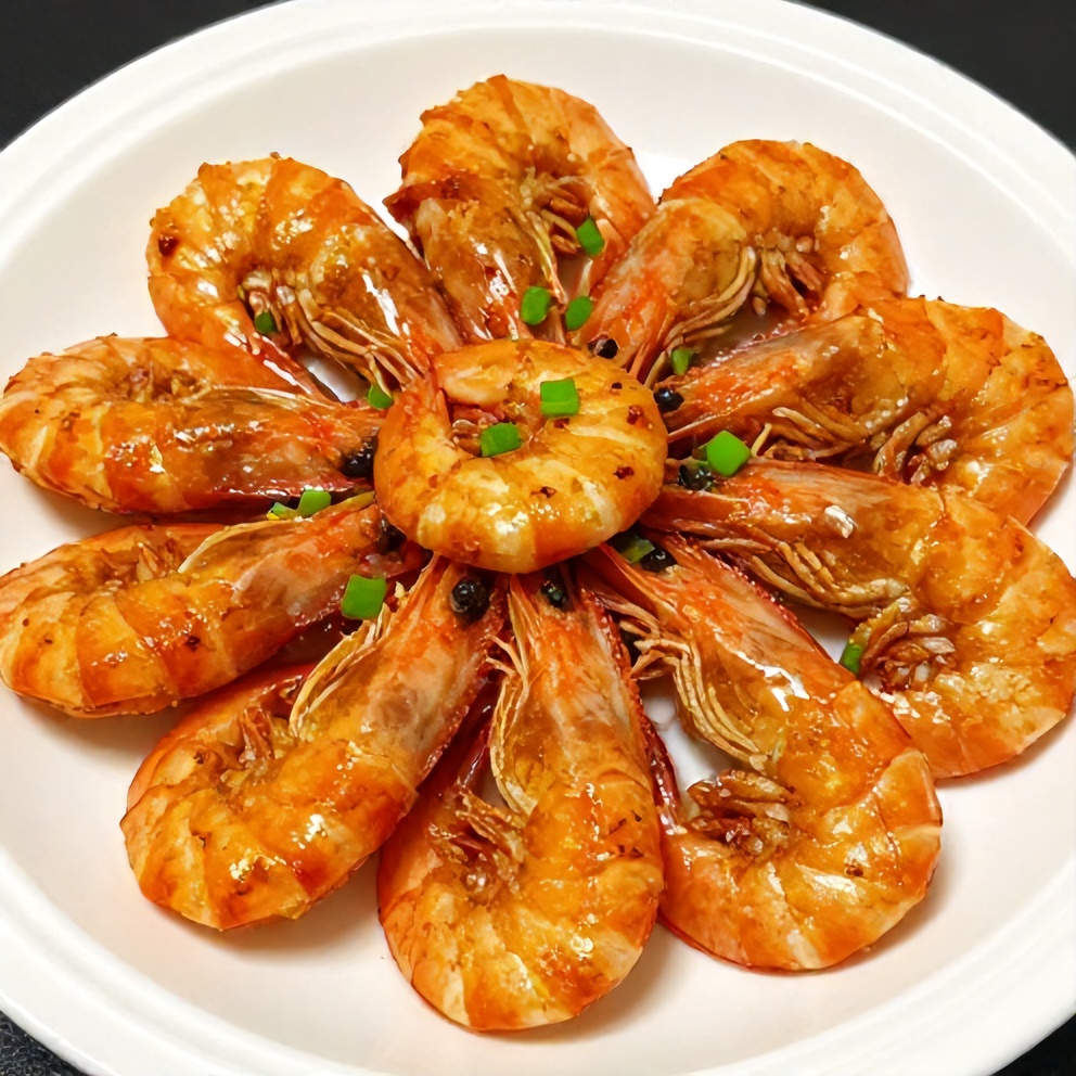 Honey garlic shrimp plated with garnish